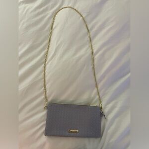 Katie Loxton Woven Vegan Leather Bag with detachable/adjustable chain.